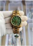 Rolex Oyster Perpetual Date Just Gold Green