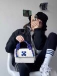 Off-White Leather Insert Gummy white with Metallic Blue Arrows At Front. Rope Handle Jitney 1.4 Shoulder Bag (D88532 White)(LB)